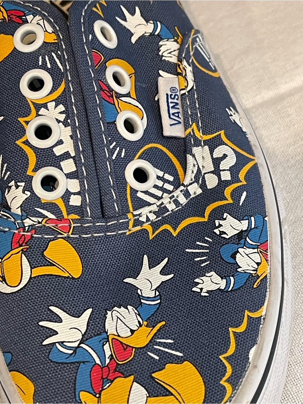 Vans Donald Duck Comic Print Slip-On Sneakers - Navy, Yellow, White, Red - Picture 2 of 7